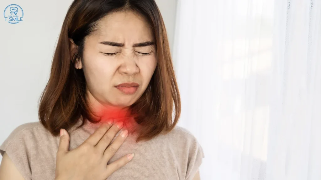 nhổ răng khôn xong bị đau họng
